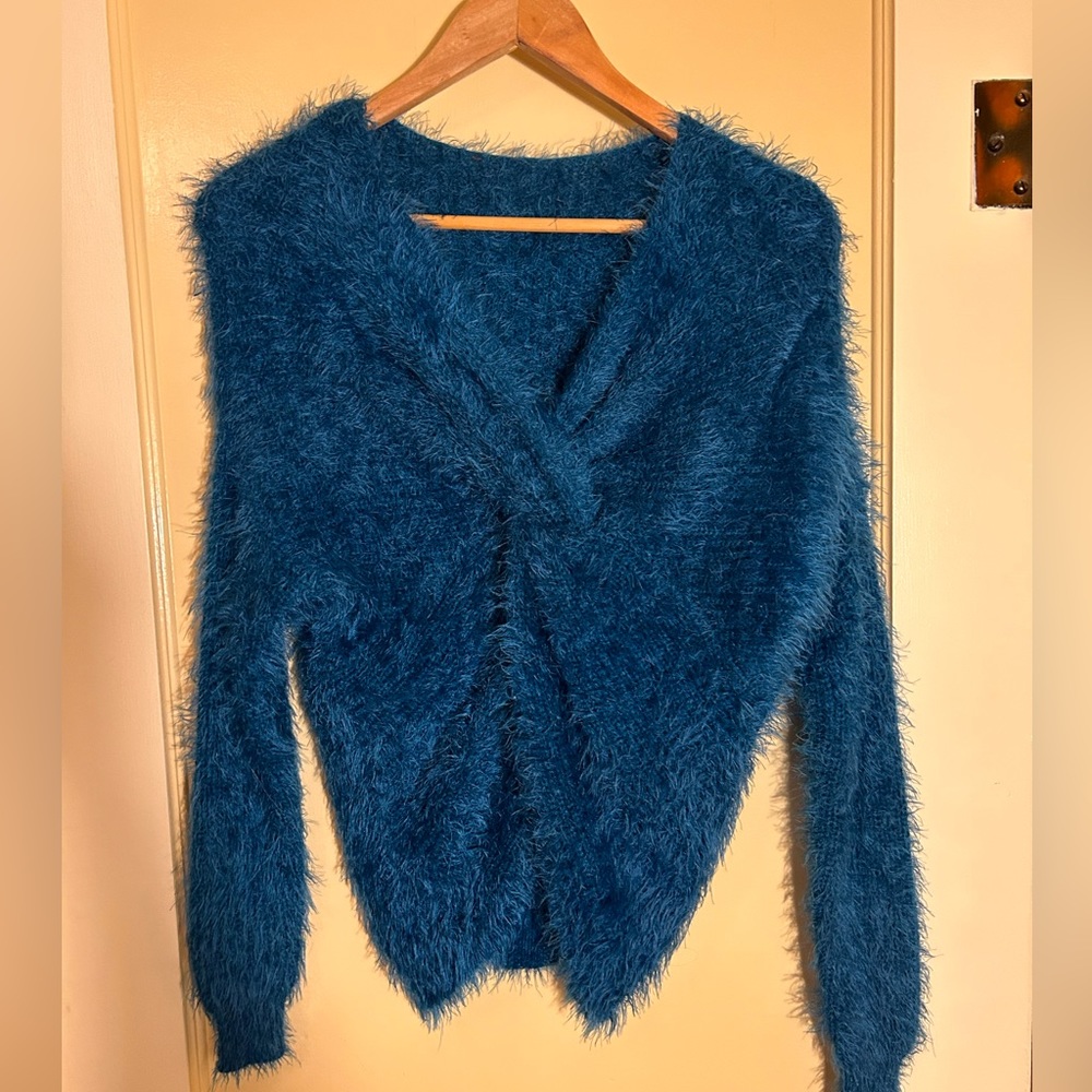 Blue eyelash V-neck tie knot sweater. Grover!